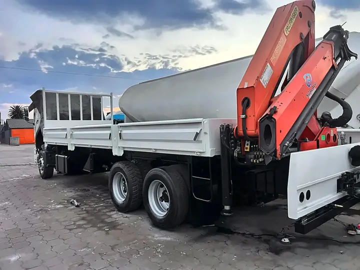 Crane truck after refurbishment, with a new white body
