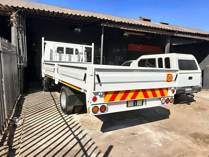 Dropside rear with lights and chevrons